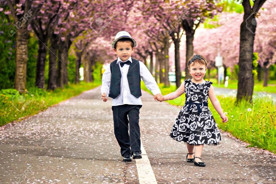 22936288-little-boy-and-girl-in-a-romantic-scene-in-nature.jpg